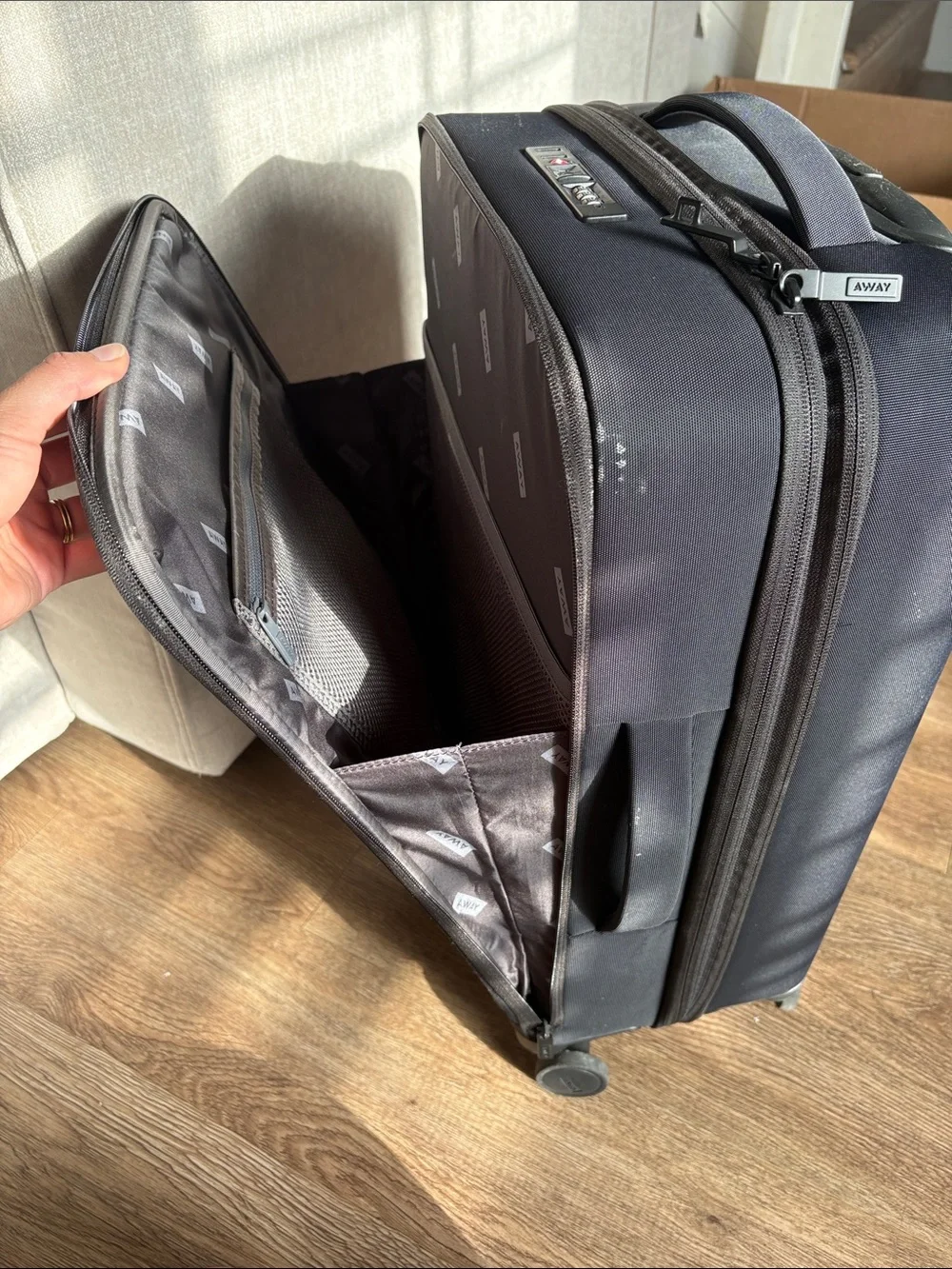 Away Black Carry-On Travel Case with Spinner Wheels (expandable collection)